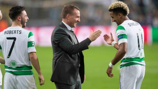 Brendan Rodgers celebrates with Celtic players