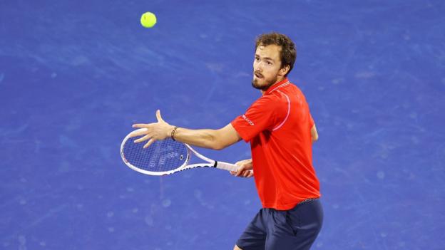 DUBAI, UAE, 4th March 2023. 2022 champion Andrey Rublev in action during  the men's singles final of the Dubai Duty Free Tennis Open Championships.  3rd seed Daniil Medvedev defeated Rublev 6-2, 6-2