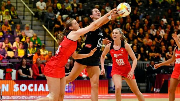 Lucy Howells of Wales and Ameliaranne Ekenasio (Captain) of New Zealand in action during the Netball World Cup 2023