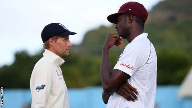 Joe Root and Jason Holder