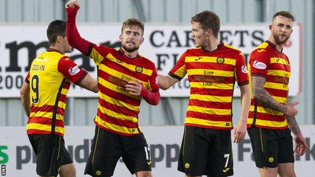 Partick Thistle's Craig Slater (centre) celebrates after firing his side ahead.
