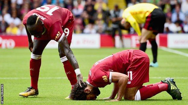 Mohamed Salah and Sadio Mane celebrate