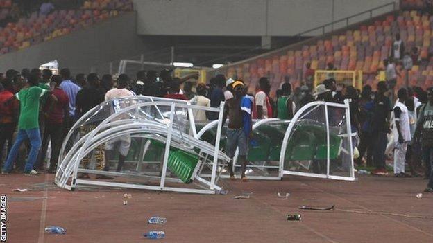 Two overturned dugouts at the Moshood Abiola National Stadium in Abuja