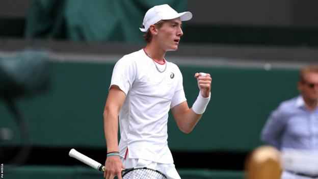 Henry Searle celebrates at Wimbledon