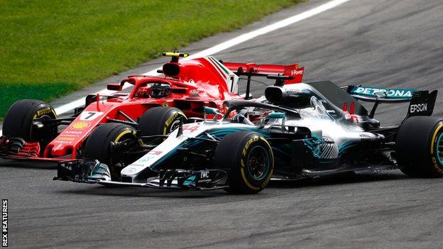 Monza, Italy. 2 September 2018. Formula One Grand Prix of Italy, race day;  Mercedes AMG Petronas Motorsport, Lewis Hamilton holds his trophy on the  podium as he wins the race Credit: Action