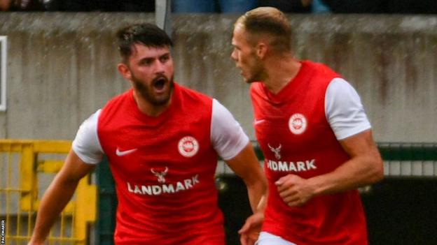 Larne goalscorer Lee Bonis receives congratulations from Leroy Millar