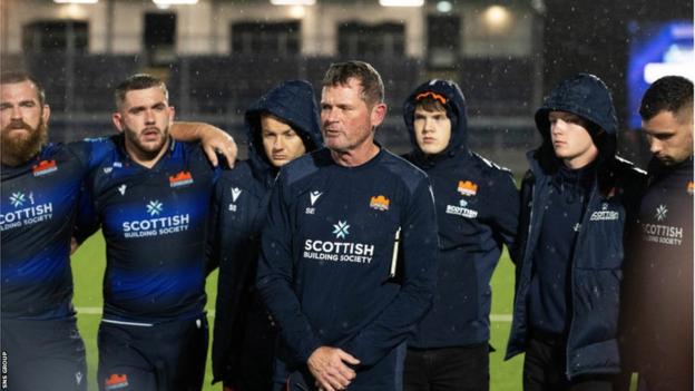 Edinburgh's Senior Coach Sean Everitt and his players at full time during a pre-season friendly between Edinburgh Rugby and Bath at the Hive Stadium