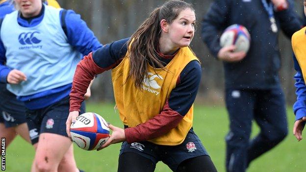 Leanne Riley passes the ball in training