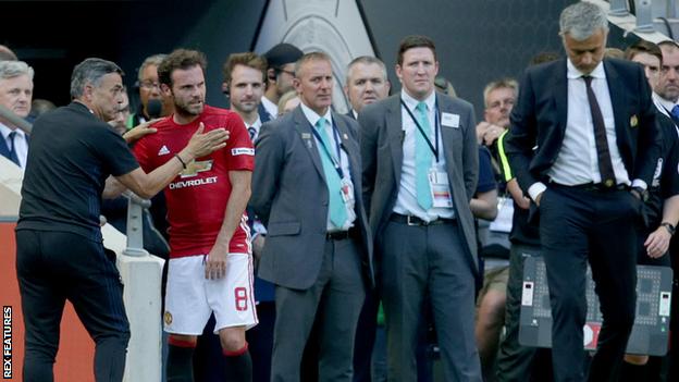 Substitute Juan Mata looks unhappy after being substituted during Manchester United's Community Shield win over Leicester City