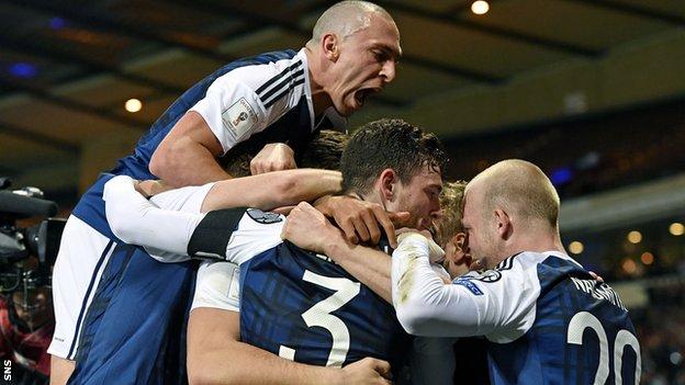 The Scotland players were jubilant after Chris Martin's late winner