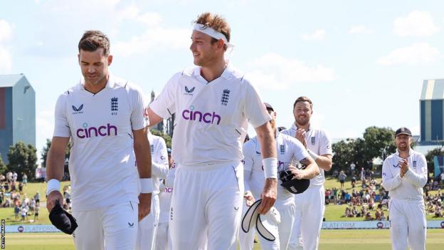 Stuart Broad and James Anderson leave the field after England complete victory