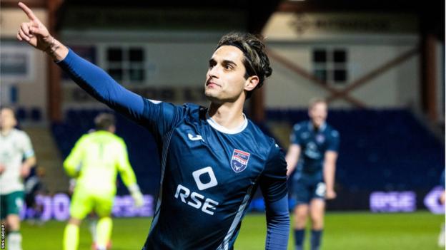 Yan Dhanda celebrates his last-gasp equaliser for Ross County against Hibernian