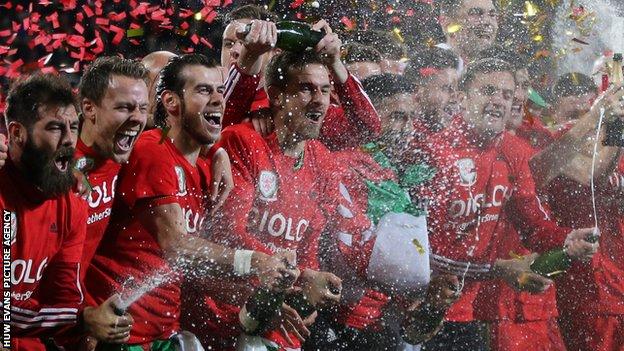 Wales players celebrate qualifying for Euro 2016 after beating Andorra in October 2015