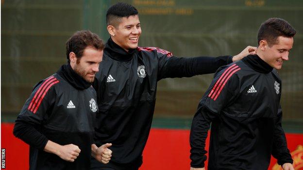 Manchester United's Marcos Rojo (centre)