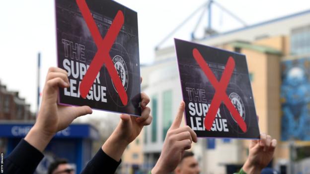 Fans protesting the establishment of the breakaway European Super League