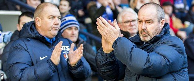 Kilmarnock manager Steve Clarke (right) applauds the fans