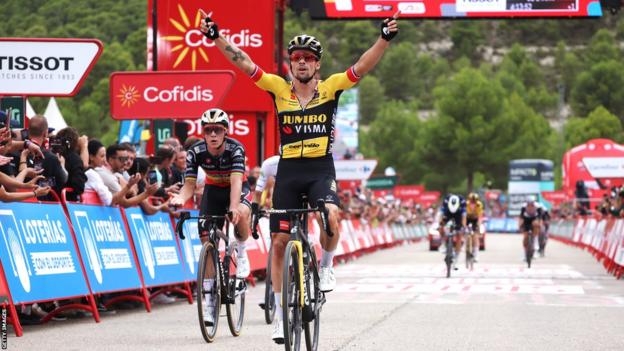 Primoz Roglic celebrates winning stage eight of the Vuelta a Espana