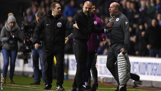 Pep Guardiola and Paul Cook