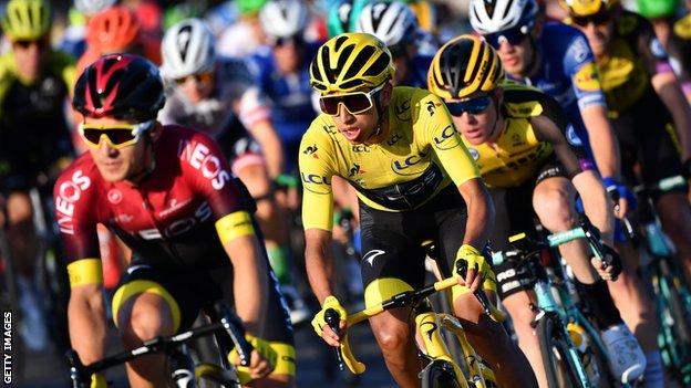 Team Ineos rider Egan Bernal races in Paris wearing the yellow jersey as winner of the 2019 Tour de France