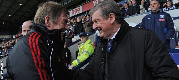 Kenny Dalglish shakes hands with Roy Hodgson