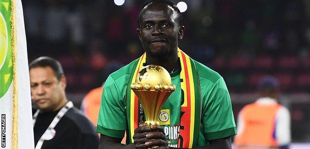 Mane with the Africa Cup of Nations trophy