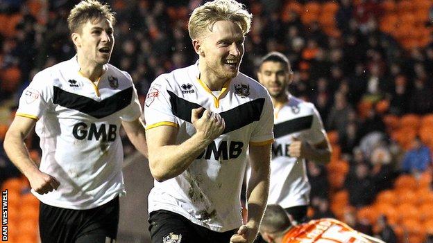 AJ Leitch Smith celebrates his winner against Blackpool
