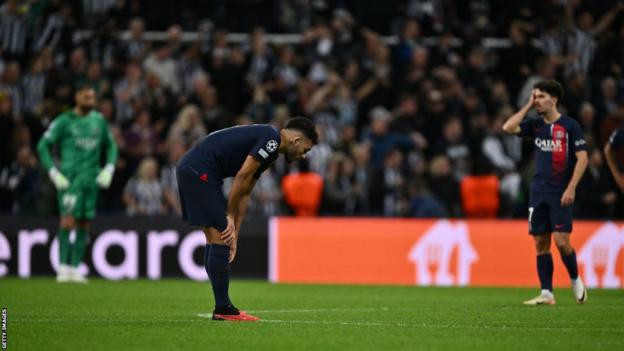 PSG players look dejected during defeat by Newcastle