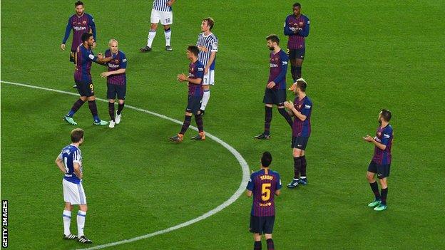 Andres Iniesta leaves the Camp Nou pitch for the final time