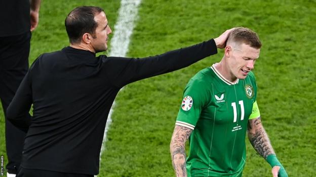 James McClean is congratulated by John O'Shea