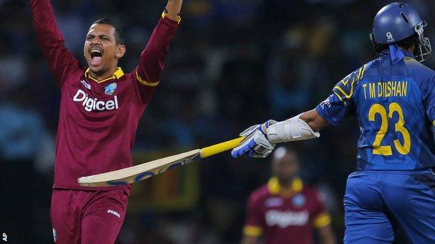 The West Indian mystery spinner Sunil Narine carries his Mohawk