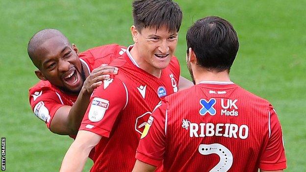 Forest players celebrate Joe Lolley's first-half goal