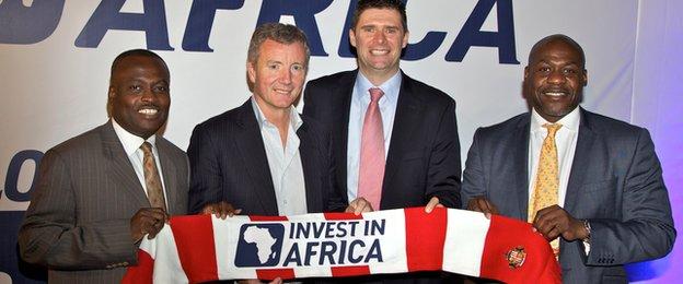 Ike Duker, Executive Chairman Tullow Ghana Ltd and Group Advisor Africa Business, Aidan Heavey Chief Executive Tullow Oil plc, Niall Quinn Director of International Development Sunderland AFC and Tutu Agyare Non-executive Director Tullow Oil plc, attend the launch of 'Invest in Africa' on January 24, 2012 in Accra, Ghana.