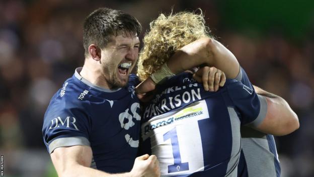 Sale Sharks captain Ben Curry celebrates their win over Saracens with his team-mates