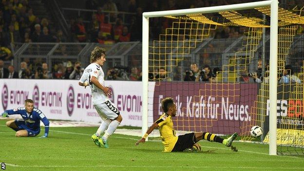 Borussia Dortmund"s Pierre-Emerick Aubameyang puts his side ahead against Freiburg
