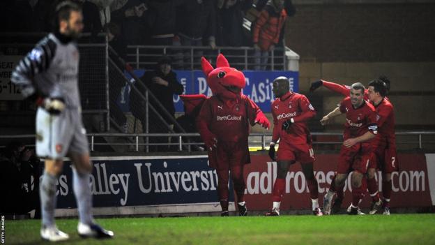 Leyton Orient celebrate Jonathan Tehoue's equaliser against Arsenal in 2011