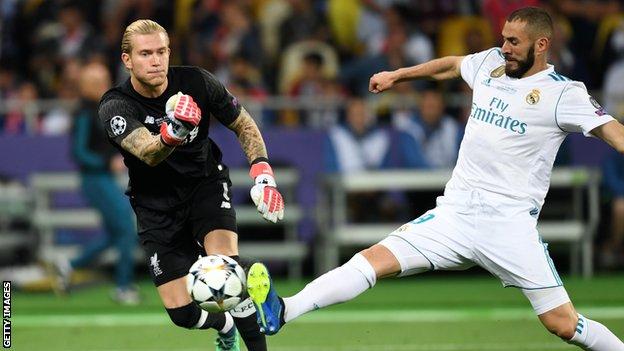 Loris Karius' throw out is intercepted by Karim Benzema