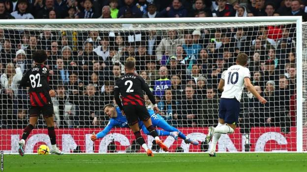 Harry Kane scores for Tottenham against Manchester City