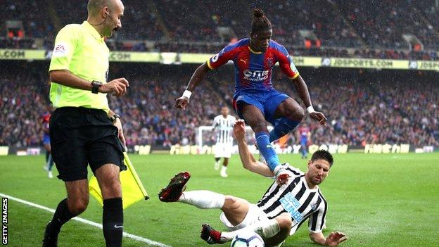 Wilfried Zaha in action against Newcastle