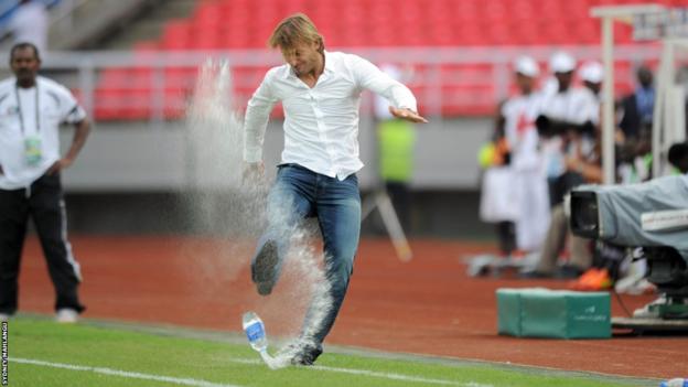 Zambia coach Herve Renard kicks out at a water bottle during the 2012 Africa Cup of Nations