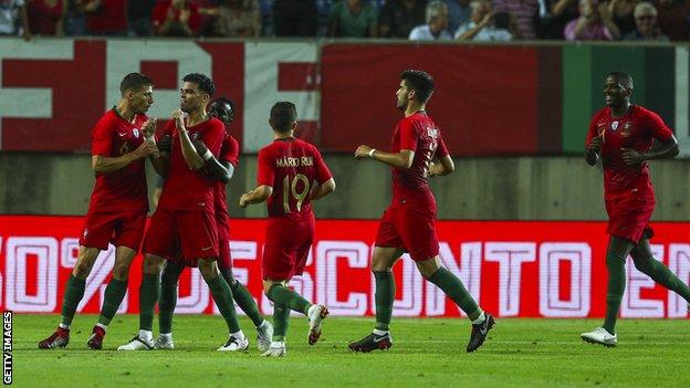 Pepe is congratulated after scoring for Portugal