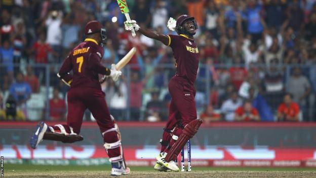 Carlos Brathwaite celebrates winning the 2016 T20 World Cup with West Indies