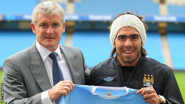 Mark Hughes and Carlos Tevez