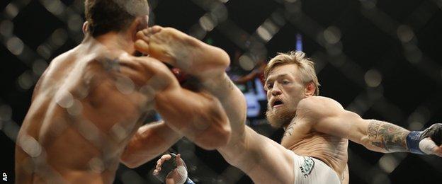 Conor McGregor (right) in action against Chad Mendes