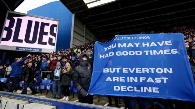 Everton fans protest against the club's ownership at Goodison Park