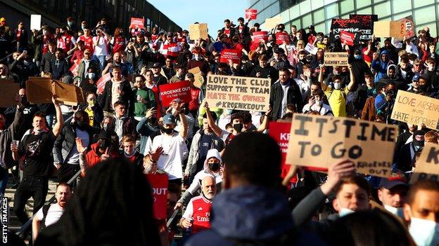 Arsenal fans gather to protest against club's owners