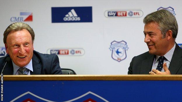 Neil Warnock and Mehmet Dalman smile (R) on the day Warnock held his first press conference as Cardiff boss in October, 2016
