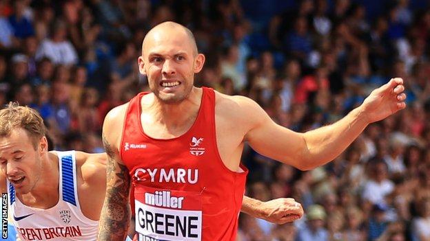 Dai Greene crosses the line first