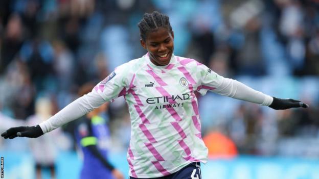 Bunny Shaw celebrates scoring against Tottenham.