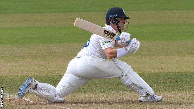 Liam Trevaskis ended unbeaten on 55 as Durham's tail piled on the runs