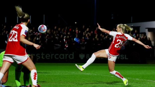 Arsenal's Stina Blackstenius scores against Aston Villa